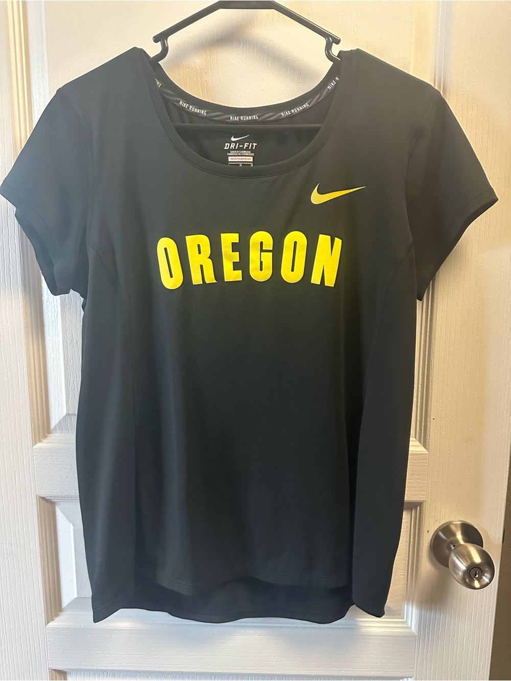 Nike Women’s Black Dri-FIT Tee with Yellow Oregon Logo